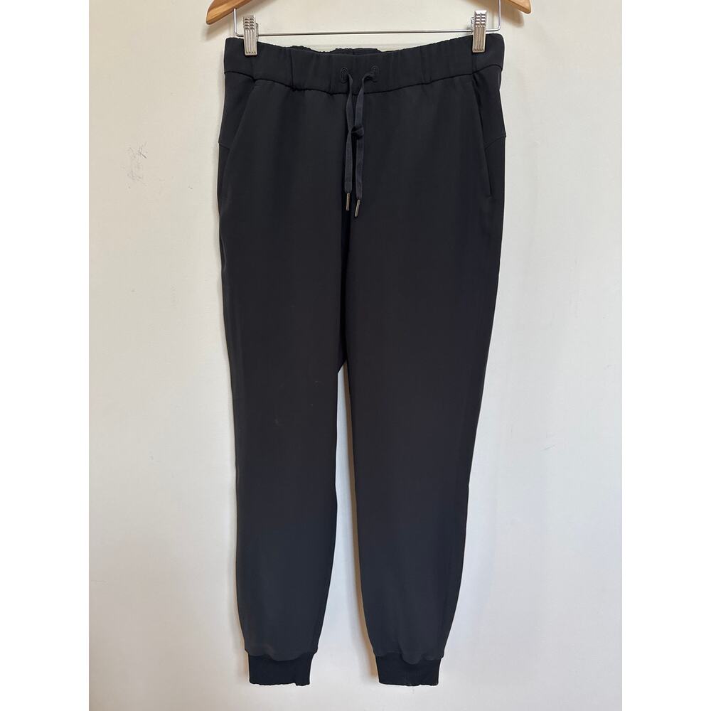 LULULEMON ON THE FLY JOGGER Womens Sz 6 Black Drawstring Stretch Pocket Pants